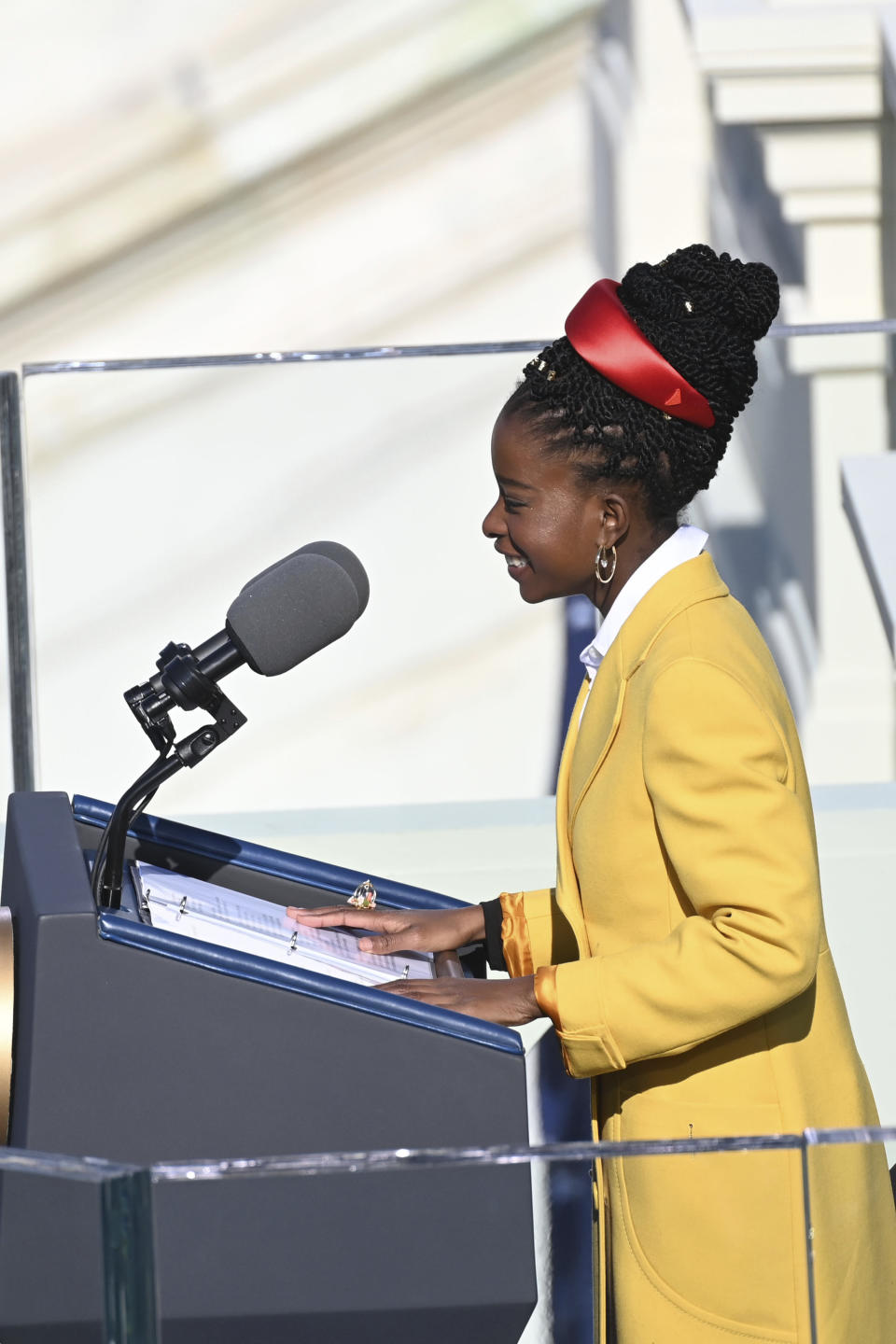 Poet Amanda Gorman recites one of her poems during the 59th Presidential Inauguration at the U.S. Capitol in Washington, Wednesday, Jan. 20, 2021. (Saul Loeb/Pool Photo via AP)