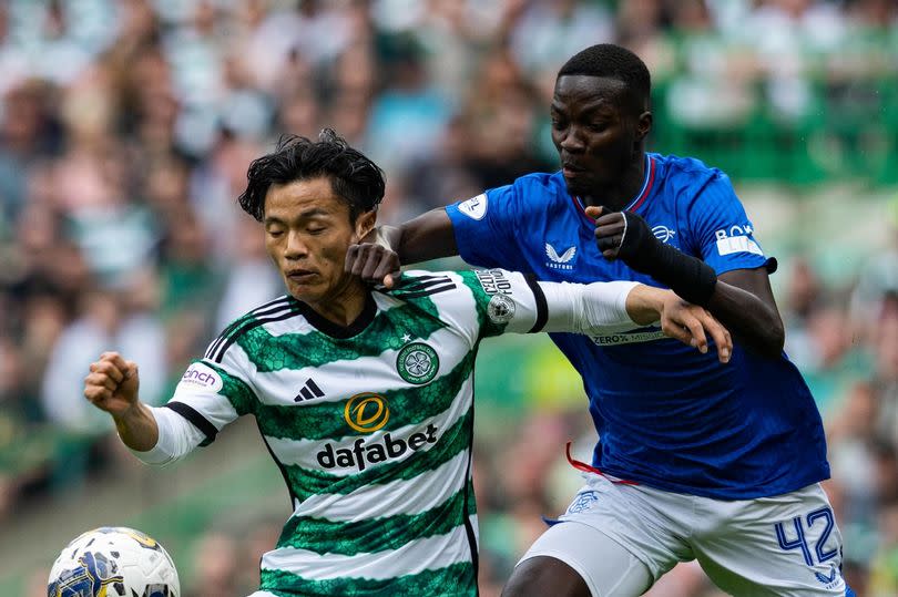 Celtic's Reo Hatate and Rangers' Mohamed Diomande