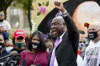 Breonna Taylor family attorney Ben Crump, center speaks during a news conference, Friday, Sept. 25, 2020, in Louisville, Ky. (AP Photo/Darron Cummings)