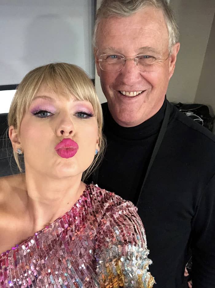 Taylor Swift and Scott Swift posing for a selfie