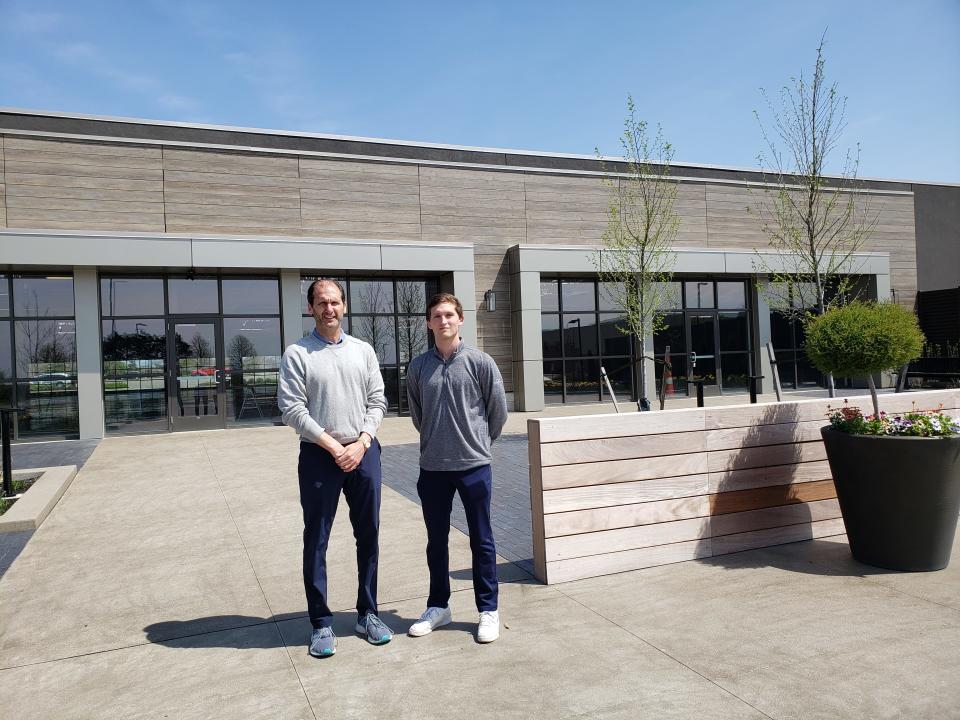 Matt Stavroff, left, president of Stavroff Land Development, and his son, Seve, showcase the former Phar-Mor space in Dublin Village that the company recently renovated.