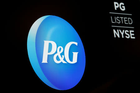 FILE PHOTO: The logo of Procter & Gamble Co. is displayed on a screen on the floor of the New York Stock Exchange in New York, U.S., June 27, 2018. REUTERS/Brendan McDermid