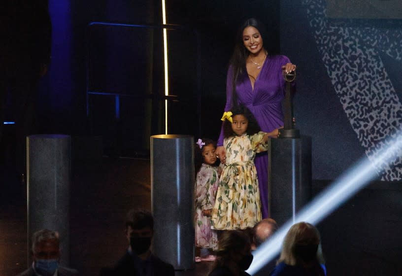 Vanessa Bryant stands with daughters Capri and Bianka after speaking on behalf Kobe on May 15, 2021.