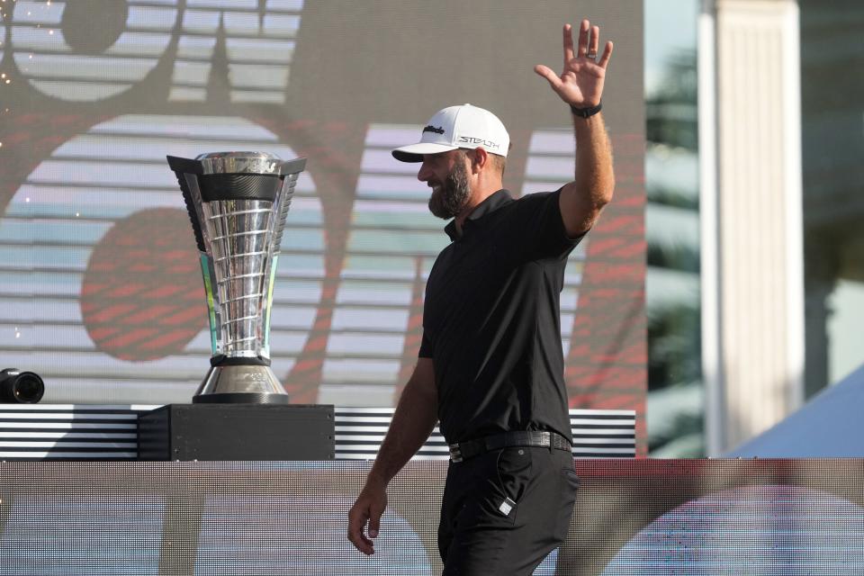 Oct 30, 2022; Miami, Florida, USA; 4Aces GC captain Dustin Johnson celebrates after winning the individual championship during season finale of the LIV Golf series at Trump National Doral. Mandatory Credit: Jasen Vinlove-USA TODAY Sports