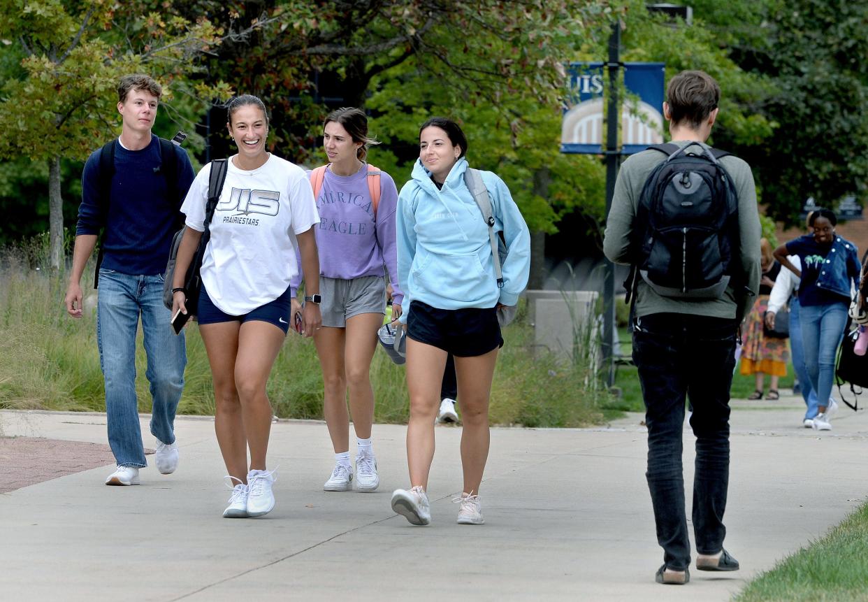 University of Illinois Springfield students walk across campus near University Hall Monday, Sept. 11, 2023.