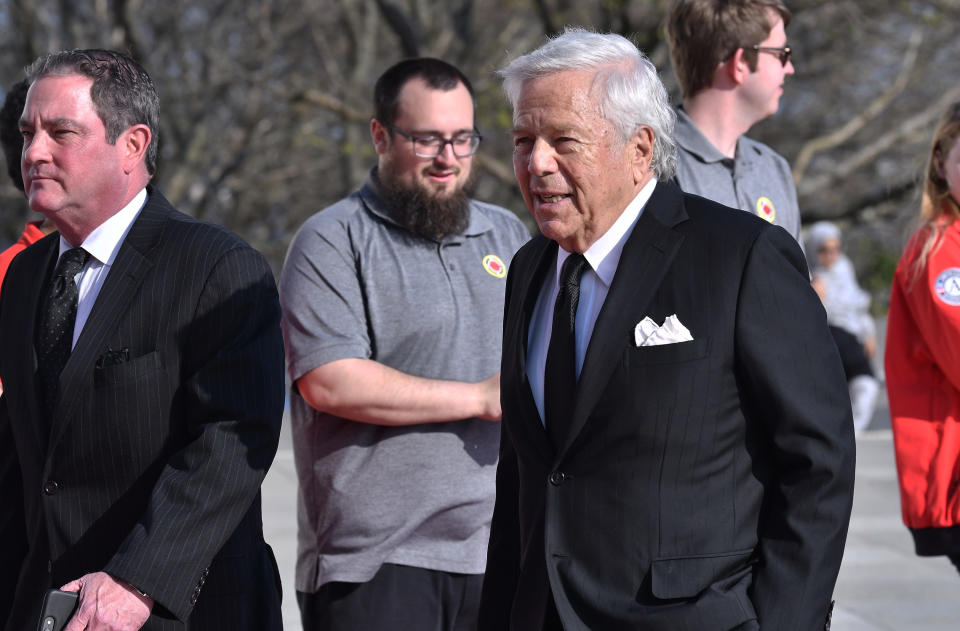 New England Patriot's owner Robert Kraft, right, arrives for a ceremony where, Speaker of the House Nancy Pelosi, D-Calif., receives the 2019 John F. Kennedy Profile in Courage Award during ceremonies at the John F. Kennedy Presidential Library and Museum, Sunday, May 19, 2019, in Boston. (AP Photo/Josh Reynolds)