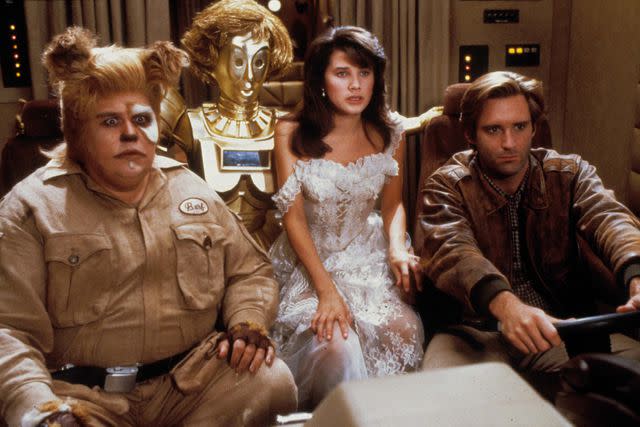 <p>Moviestore/Shutterstock</p> From L: John Candy, Lorene Yarnell, Daphne Zuniga and Bill Pullman in <em>Spaceballs</em> (1987)