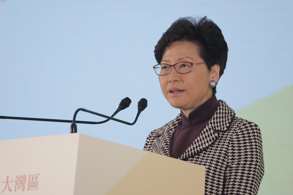 Hong Kong's Chief Executive Carrie Lam speaks during a symposium on the "Outline Development Plan for the Guangdong-Hong Kong-Macao, Greater Bay Area" in Hong Kong, Thursday, Feb. 21, 2019. The Greater Bay Area linking up Hong Kong, Macao with 9 other cities is set to shift the Southern China from traditional manufacturing into a world-class hi-tech economic powerhouse to rival the Silicon Valley and Tokyo's Bay Area. (AP Photo/Kin Cheung)