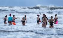 Women swimmers brave freezing conditions