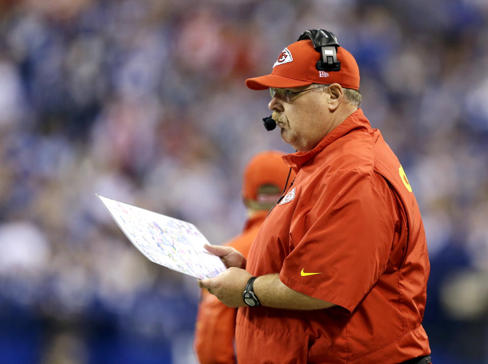 Kansas City Chiefs head coach Andy Reid watches action from the sideline against the Indianapolis Colts during the first half of an NFL wild-card playoff football game Saturday, Jan. 4, 2014, in Indianapolis. (AP Photo/Michael Conroy)
