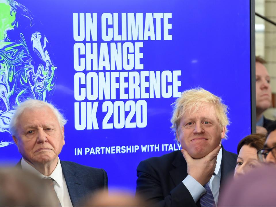 <p>Boris Johnson, seen with Sir David Attenborough, wants to reduce nation’s carbon footprint before the COP26 summit next November</p> (Getty)