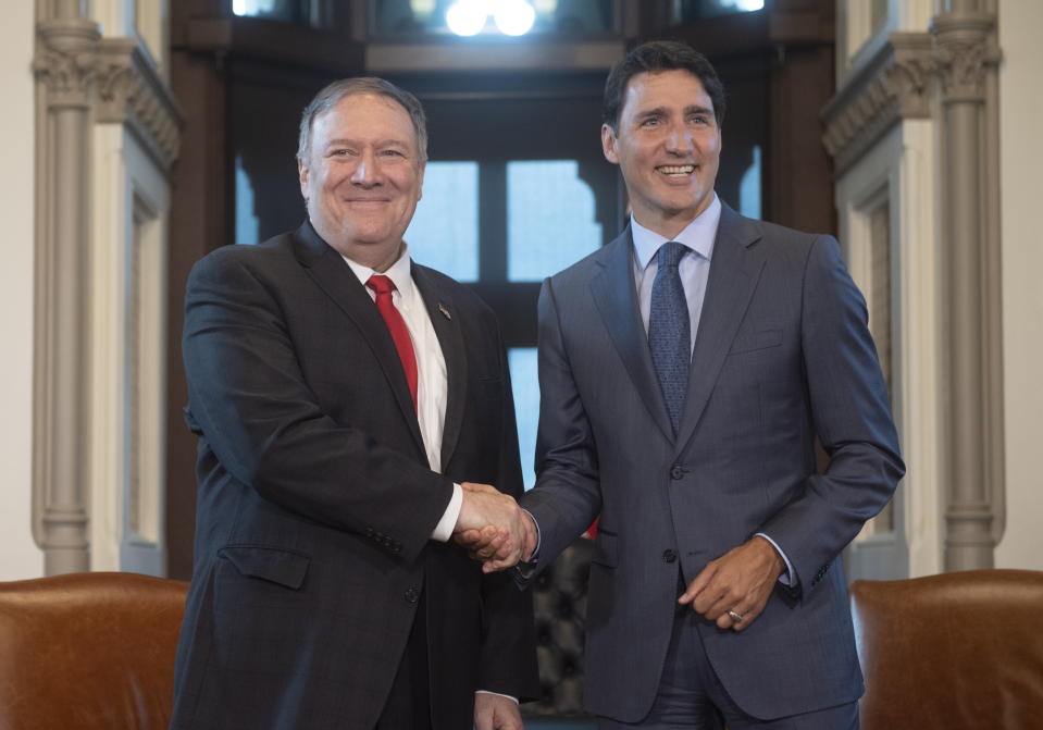 Canadian Prime Minister Justin Trudeau meets with U.S. Secretary of State Mike Pompeo on Parliament Hill in Ottawa, Thursday Aug. 22, 2019. (Adrian Wyld/The Canadian Press via AP)