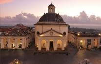 <p><strong>Tell me: What’s this place all about?</strong><br> This impressive baroque palazzo renovated by Gian Lorenzo Bernini was once home to the powerful Chigi family, one of the most important Italian Papal dynasties. Famed director Luchino Visconti filmed scenes from <em>The Leopard</em> here in 1963, and the place looks the same now as it did then.</p> <p><strong>What’s it like being there?</strong><br> This baroque palace flies under the radar, but its grandiosity could be compared to the great palaces of Rome, Florence, and Venice.</p> <p><strong>Is there a guide involved?</strong><br> The rooms of the Piano Nobile (i.e. the main floor) can only be seen on a guided tour, which costs 8 euros.</p> <p><strong>Did it meet expectations?</strong><br> The sybaritic Cardinal Flavio Chigi amassed an impressive collection of 17th-century baroque paintings and furnishings, which remain on display. Wandering through rooms like the "Stanza delle Belle" lined with portraits of Roman beauties, the Landscapes Room, and the Nun's Room featuring portraits of the ten Chigi sisters feels like stepping back in time.</p> <p><strong>So, then, what, or who, do you think it’s best for?</strong><br> You'll probably want more than an hour to tour this opulent baroque palazzo and may want to linger even longer in the Chigi Park, which was a favorite stop on the Grand Tour.</p>