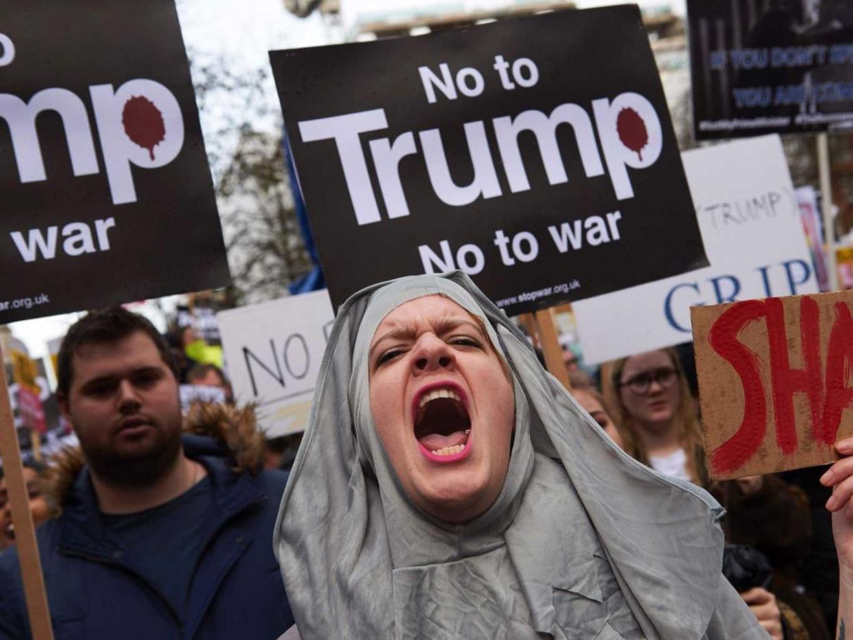 Protesters marched from the US embassy to Downing Street in a previous demonstration: Getty