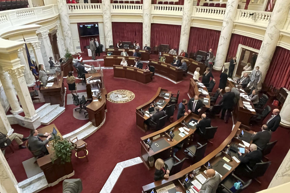 FILE - The Idaho Senate gathers in the Statehouse in Boise, Idaho, Jan. 15, 2021. The Idaho Senate is expected to take a final vote on Monday, March 18, 2024, on a bill that would prohibit transgender and nonbinary Idahoans enrolled in Medicaid, or state employees enrolled in the state's insurance plan, from obtaining gender-affirming care. (AP Photo/Keith Ridler, File)