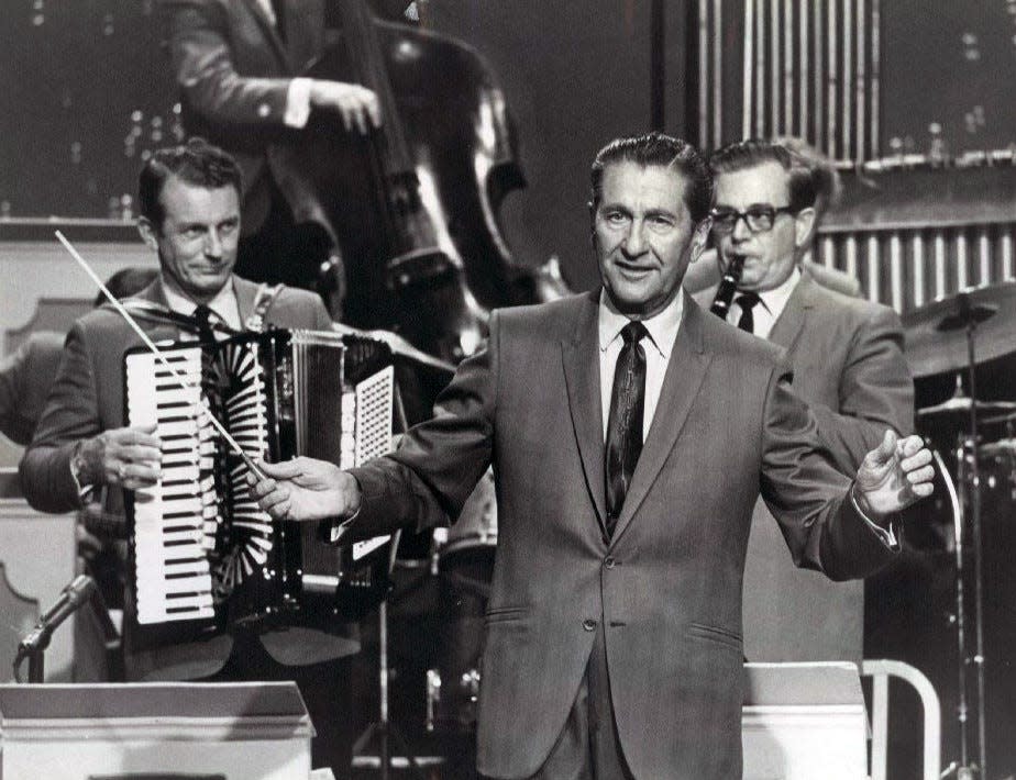 South Dakota native Myron Florens, left, plays his accordion on The Lawrence Welk Show in a 1969 show publicity photo.
