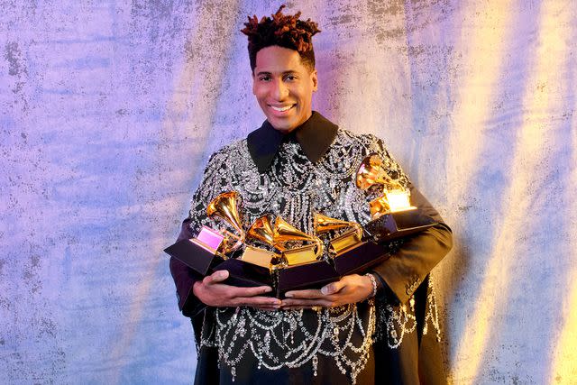 <p>Lindsey Byrnes/Contour by Getty</p> Jon Batiste with his Grammys in April 2022