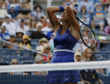 Madison Keys, of the United States, reacts after a shot against Aleksandra Krunic, of Serbia, during the second round of the 2014 U.S. Open tennis tournament, Thursday, Aug. 28, 2014, in New York. (AP Photo/Peter Morgan)