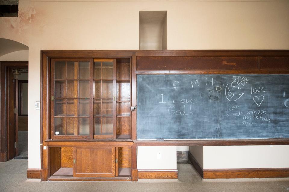 A classroom in York, Penn., has cutouts in the wall. They are part of the original hot air heating system that brought in fresh air.