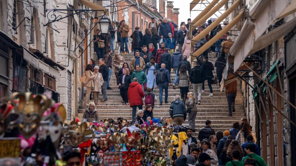 PHOTO: Tourists on Rialto Bridge in Venice, Italy, March 15, 2024. (Nathan Laine/Bloomberg via Getty Images)