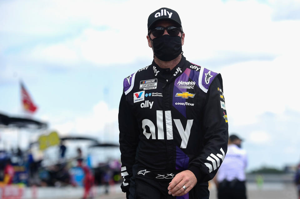 LONG POND, PENNSYLVANIA - JUNE 28: Jimmie Johnson, driver of the #48 Ally Chevrolet, walks on the grid prior to the NASCAR Cup Series Pocono 350 at Pocono Raceway on June 28, 2020 in Long Pond, Pennsylvania. (Photo by Jared C. Tilton/Getty Images)