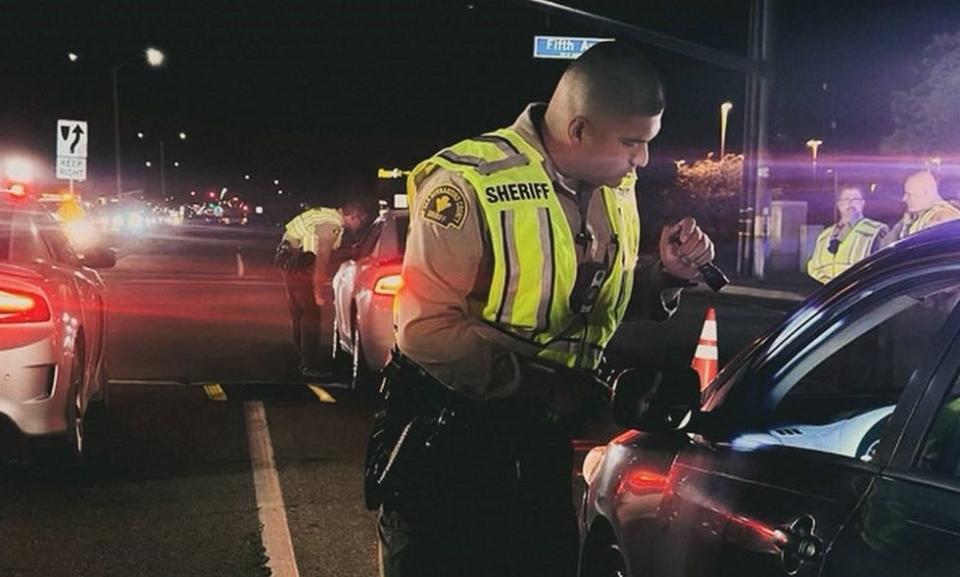 Deputies hold a sobriety checkpoint at Bear Valley Road and 5th Street in Hesperia on Friday, May 10, 2024.