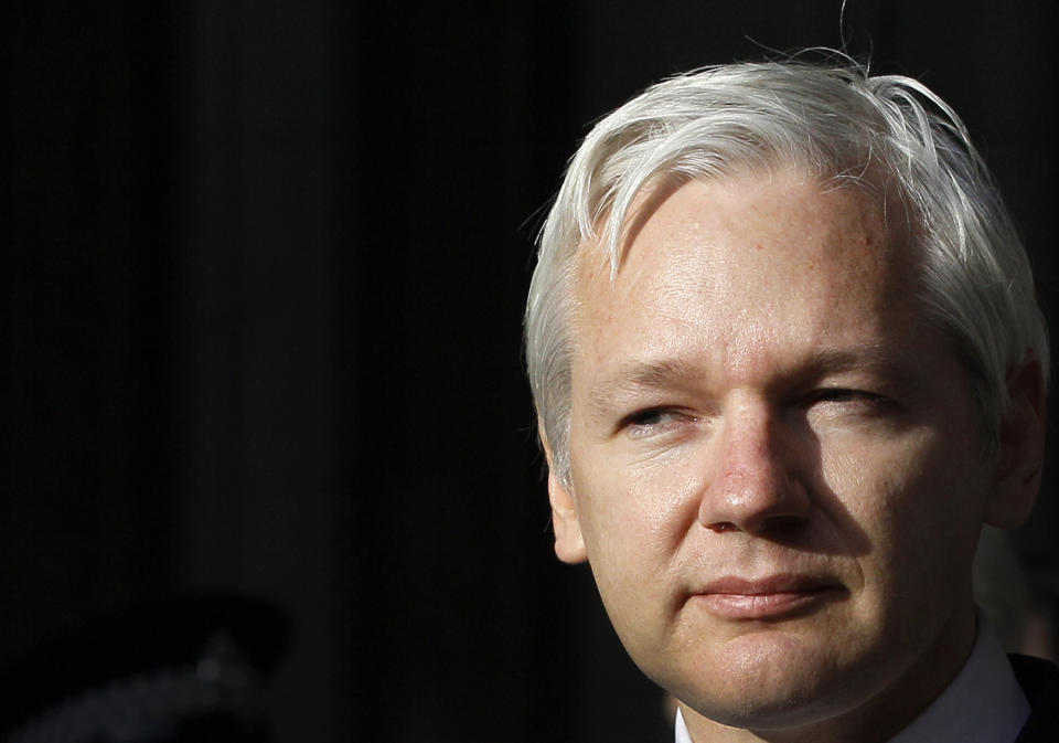 FILE - WikiLeaks founder Julian Assange pauses as he makes a statement to media gathered outside the High Court in London, on Dec. 5, 2011. U.S. Secretary of State Antony Blinken on Saturday, July 29, 2023 pushed back against Australian demands for an end to Assange’s prosecution, saying the Australian citizen was accused of “very serious criminal conduct” in publishing a trove of classified documents more than a decade ago.(AP Photo/Kirsty Wigglesworth, File)