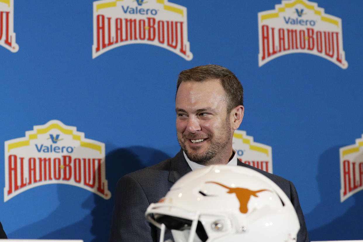 Texas head coach Tom Herman takes part in a news conference for the Alamo Bowl NCAA college football game, Thursday, Dec. 12, 2019, in San Antonio. Texas will face Utah in the Alamo Bowl. (AP Photo/Eric Gay)