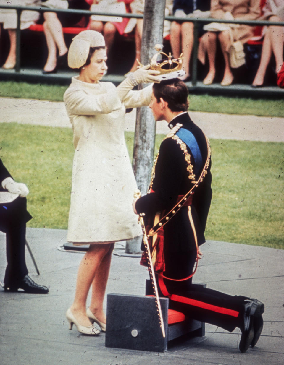 Queen Elizabeth II crowns her son Charles, Prince of Wales, during his investiture ceremony at Caernarvon Castle in Wales on July 1, 1969. (Hulton Archive / Getty Images)