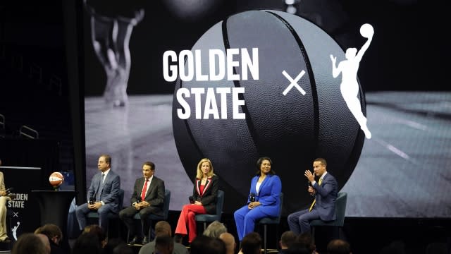 Joe Lacob, Peter Guber, Cathy Engelbert answering questions on the expansion