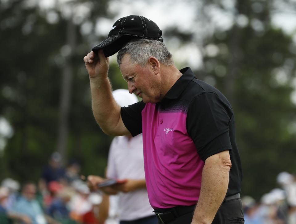 Ian Woosnam, of Wales, tips his hat as he walks off the 18th hole during the second round for the Masters golf tournament Friday, April 12, 2019, in Augusta, Ga. Woosnam says this will be his last Masters. (AP Photo/Matt Slocum)