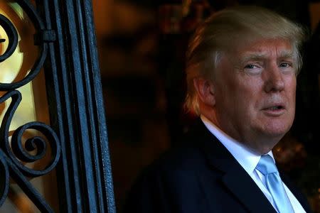 U.S. President-elect Donald Trump speaks briefly to reporters between meetings at the Mar-a-lago Club in Palm Beach, Florida, U.S. December 28, 2016. REUTERS/Jonathan Ernst