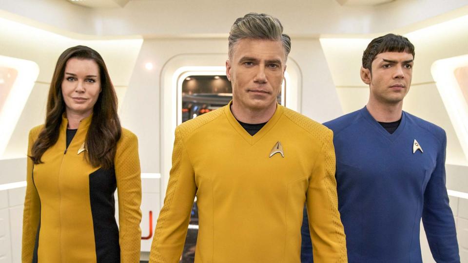 (L to R) Rebecca Romijn as Number One, Anson Mount as Captain Christopher Pike and Ethan Peck as Science Officer Spock in Star Trek: Strange New Worlds