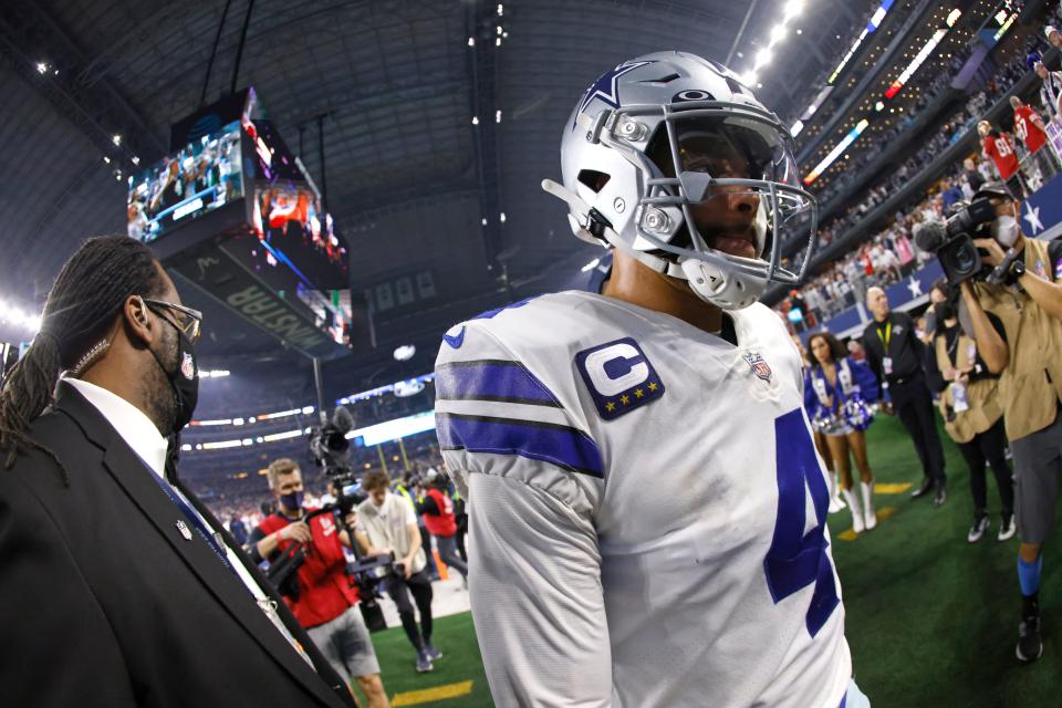 Dak Prescott walks off the field following the Cowboys' wild-card playoff loss to the 49ers.