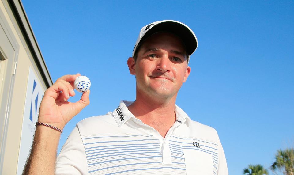 ATLANTIC BEACH, FL - SEPTEMBER 28: Sam Saunders holds up a ball inscribed with the number 59 after a birdie on the ninth green (his 18th) gave him a score of 59 during the first round of the Web.com Tour Championship held at Atlantic Beach Country Club on September 28, 2017 in Atlantic Beach, Florida. (Photo by Michael Cohen/Getty Images)