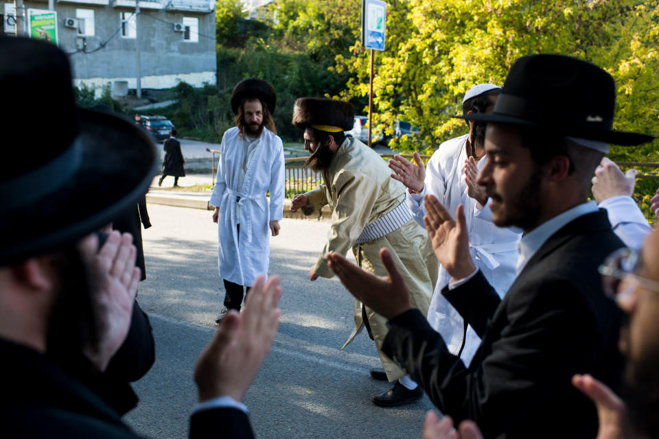 Hasidic pilgrims sing and dance during the annual Rosh Hashanah pilgrimage to the tomb of Rabbi Nachman of Breslov in Uman, Ukraine, on Sept. 27, 2022.<span class="copyright">Pete Kiehart—Redux</span>