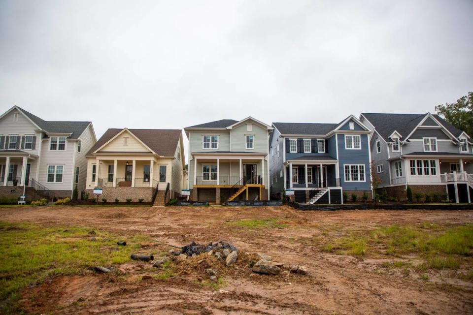 Houses in various states of completion are seen side by side in 751 South, a development in Durham, N.C., on Friday, Sept. 25, 2020.