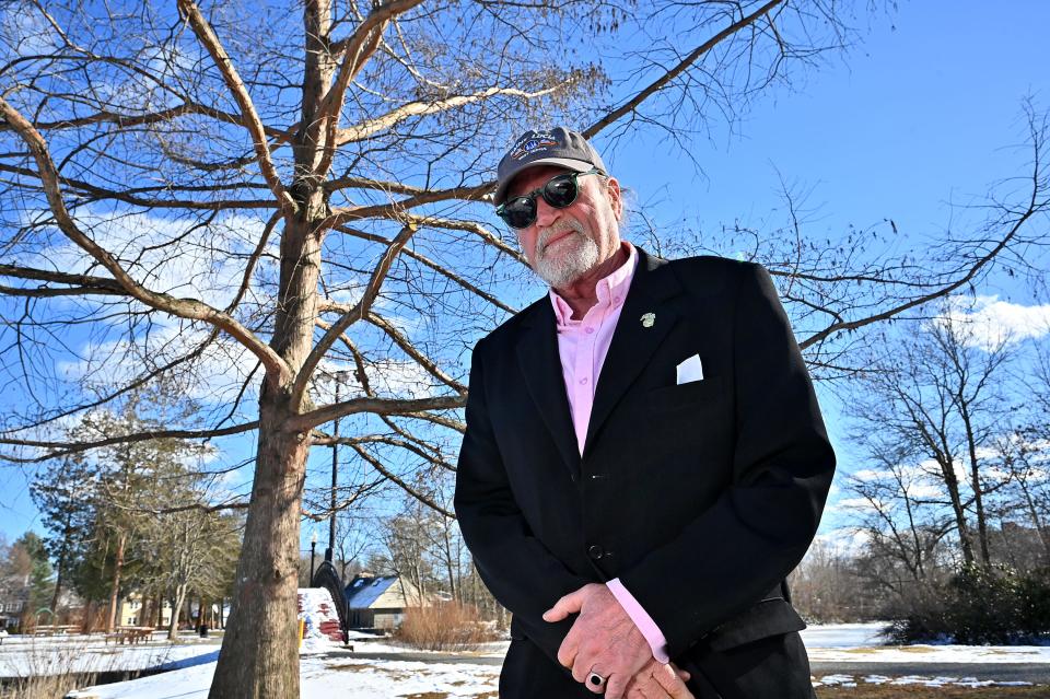 Alan Thorpe, cousin of Kevin Harkins, who was murdered 30 years ago this week, stands in front of a tree he planted at Elm Park in Kevin's memory.