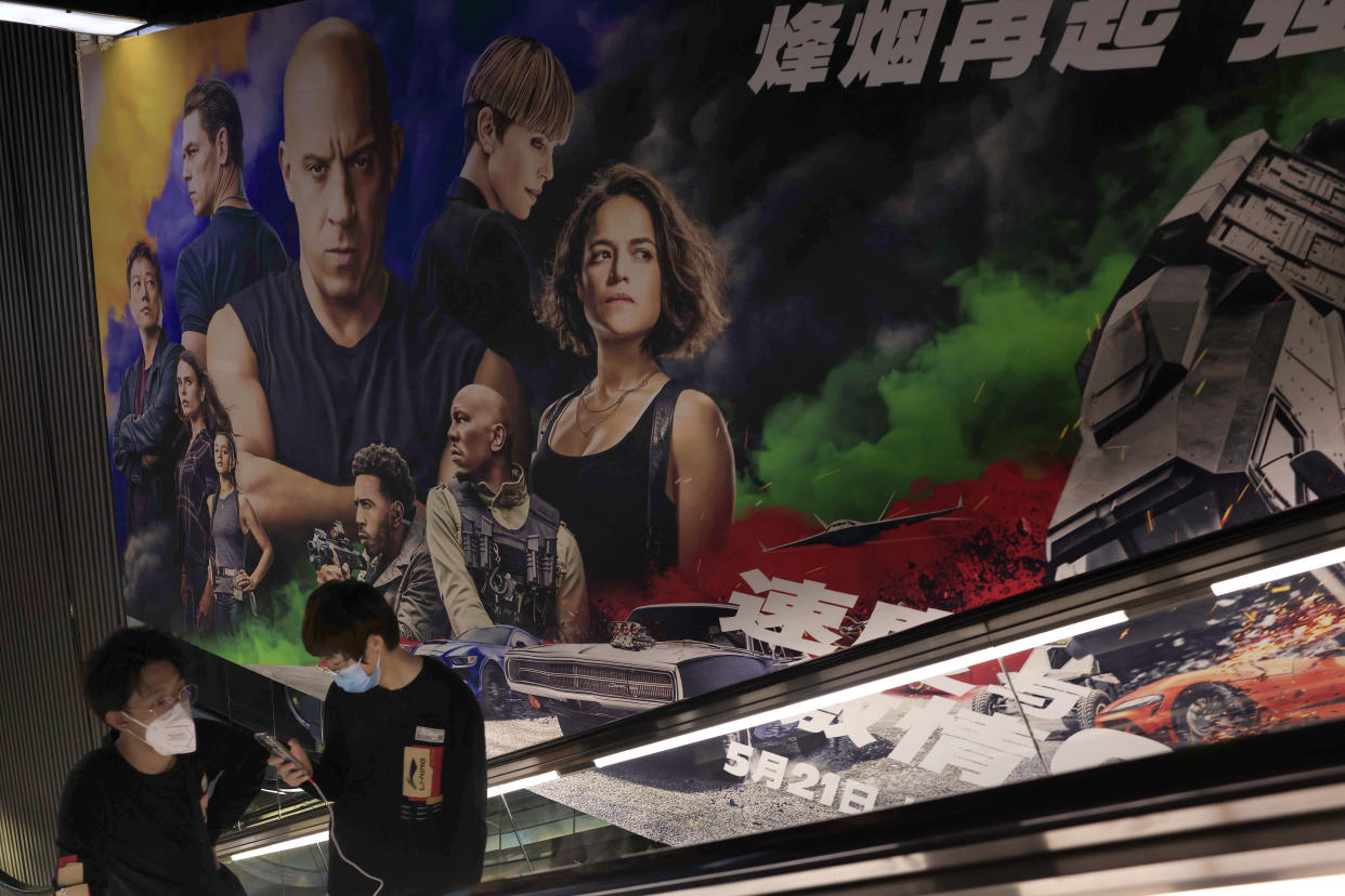 A poster for the movie "Fast & Furious 9" is seen at a movie theater in Beijing Wednesday, May 5, 2021. Pro-wrestling champion and actor John Cena is apologizing after calling Taiwan a country in promotional interviews for his upcoming film “Fast & Furious 9.” (AP Photo/Ng Han Guan)