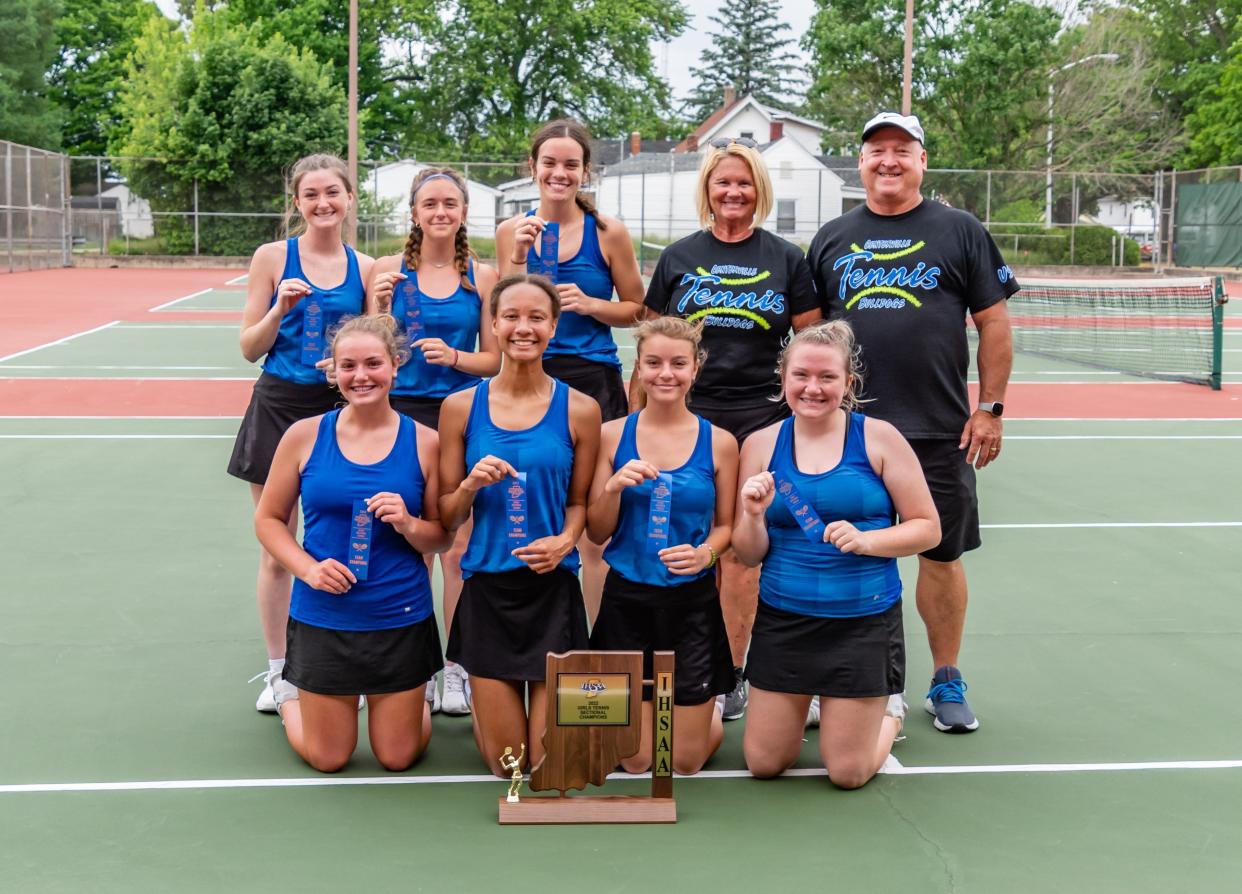 Centerville's girls' tennis team poses after winning a sectional title May 21, 2022.