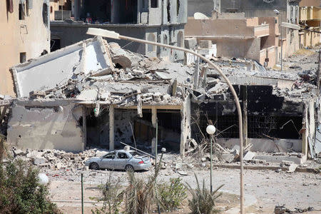 A destroyed building is seen following a battle between Libyan forces allied with the U.N.-backed government and Islamic State militants in neighbourhood Number One in central Sirte, Libya September 7, 2016. REUTERS/Hani Amara