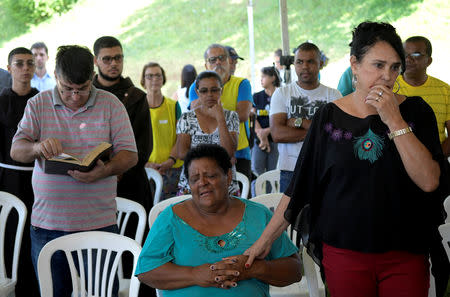 Residents attend an ecumenical service in memory of victims of a collapsed tailings dam owned by Brazilian mining company Vale SA, in Brumadinho, Brazil January 31, 2019. REUTERS/Washington Alves