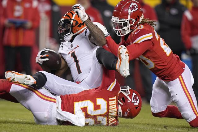 Cincinnati, United States. 02nd Jan, 2022. Cincinnati Bengals quarterback  Joe Burrow (9)runs the football under pressure from Kansas City Chiefs  defense during the second half of play at Paul Brown Stadium in