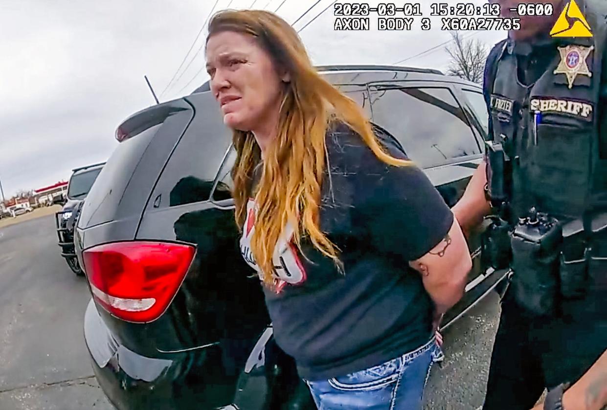 Elizabeth Cornett is shown in the screenshot from bodycam video after she was arrested in 2023. She agreed Monday to serve four years in prison for being an accessory to murder.