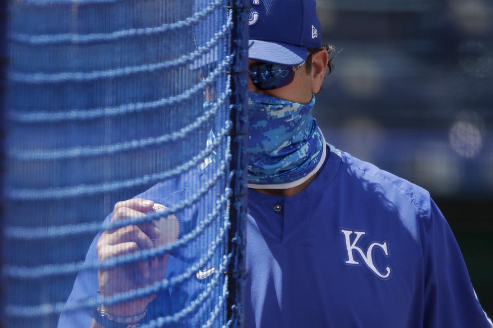 Kansas City Royals manager Mike Matheny watches baseball practice at Kauffman Stadium on Thursday, July 9, 2020, in Kansas City, Mo. (AP Photo/Charlie Riedel)