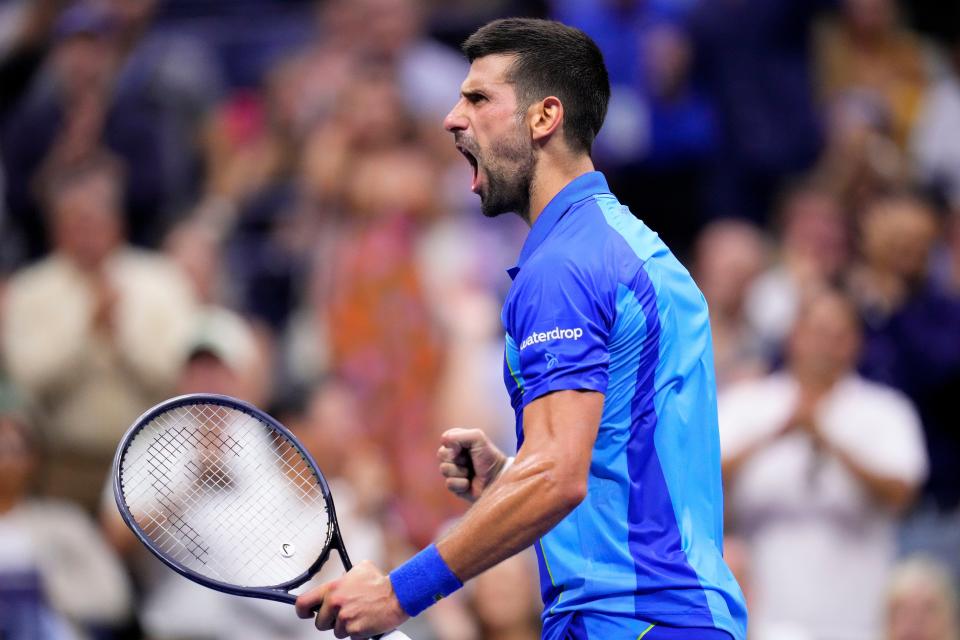 Novak Djokovic, of Serbia, reacts after winning a point (AP)