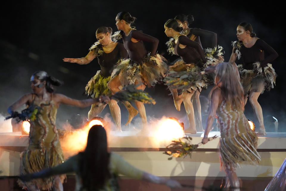 Traditional dancers perform on the pitch before the Women's World Cup soccer match between Australia and Ireland at Stadium Australia in Sydney, Australia, Thursday, July 20, 2023. (AP Photo/Mark Baker)