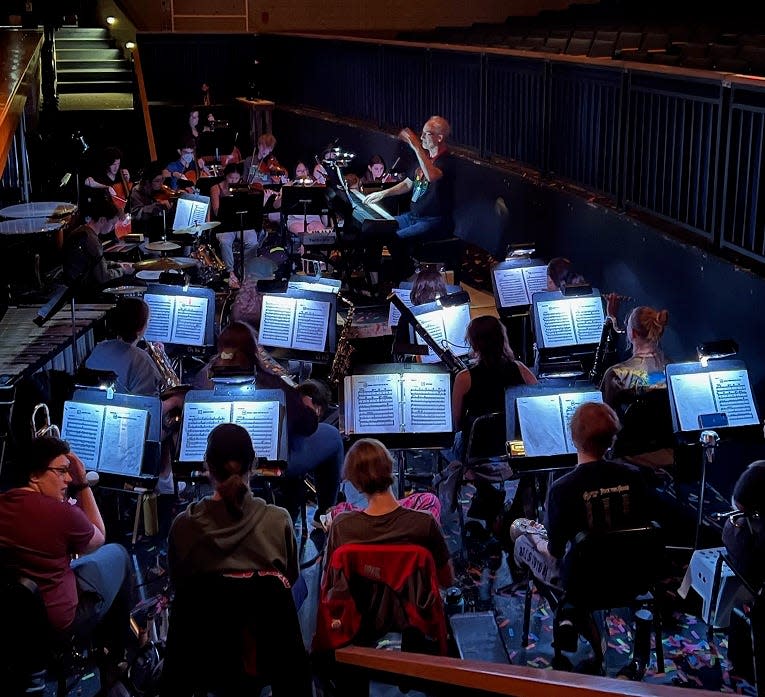 Bruce Piper leads the Granville High School student pit orchestra in a rehearsal for "Cinderella." The musical will be preformed by GHS students May 6 at 7 p.m. and May 7 at 2 p.m. and 7 p.m. in the Granville High School Performing Arts Center.