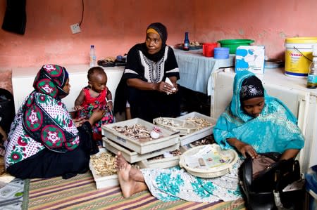 The Wider Image: Tanzania's Zanzibar begins to register traditional healers