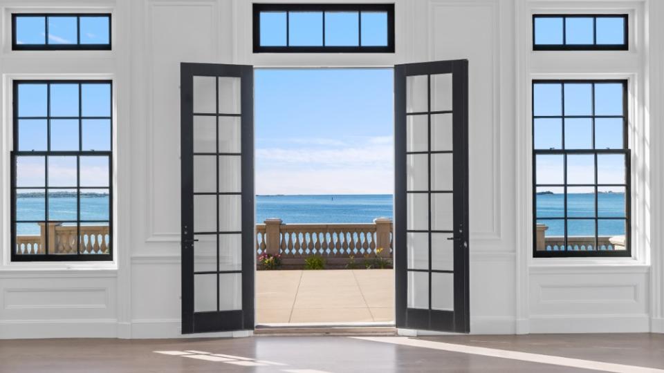 French doors open onto the terrace. - Credit: Douglas Elliman